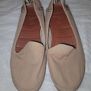 CROCS Stretch Sole Skimmer canvas loafers in a brown/khaki color.